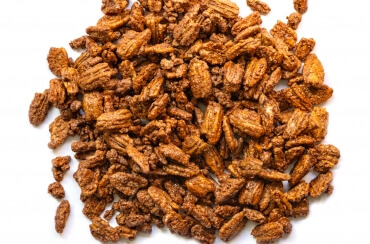 bulk pecans loose on a white background 
